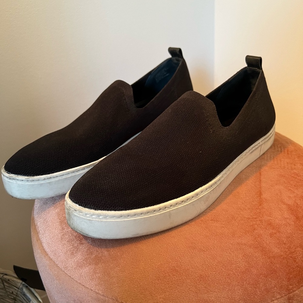 Black and white slide on sneakers